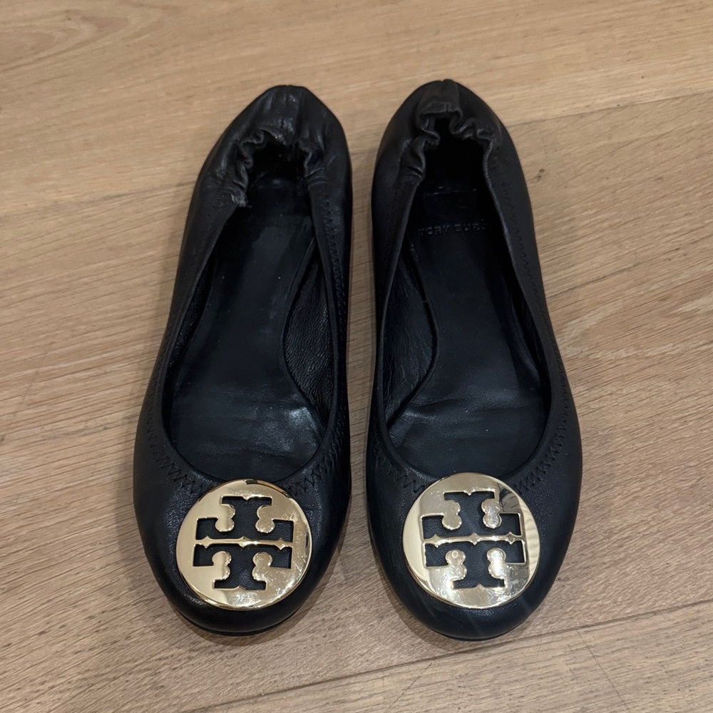 Tory Burch Black Flats with Gold Emblem